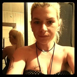 Black. Strapless dress with white polka dots